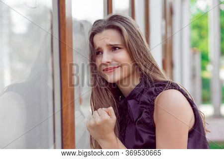 Upset Outside In The City. Beautiful Young Woman With Stressed About To Cry Near Her Office Store Wi