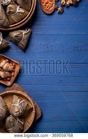 Zongzi - Dragon Boat Festival Concept Rice Dumpling, Traditional Chinese Food On Blue Wooden Backgro
