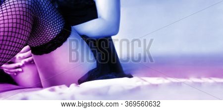 Sexy Lady Leg With Net And Seethrue Dress On Dark Light On Bed. Sexual Healthy Concept With Banner S