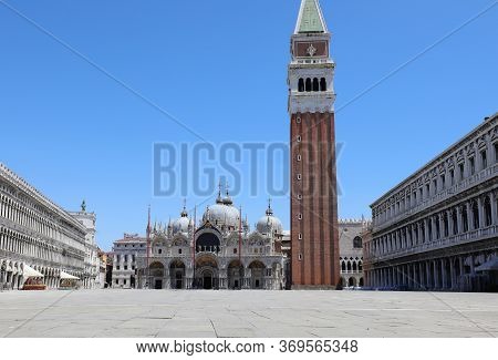 Empty Main Square Of Venice During Lockdown  Caused By Corona Virus And The Basilica Of Saint Mark A