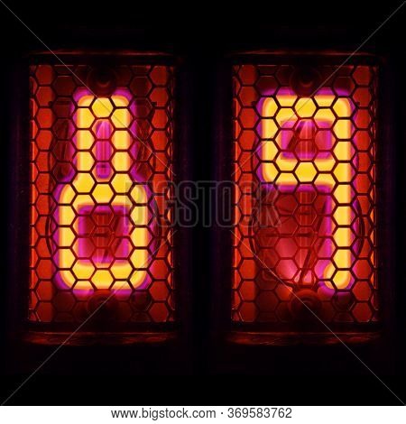 The Nixie Tube Indicator Of The Numbers Of Retro Style. Indicator Glow With A Magical Purple Fringin
