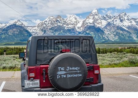 The Famous Off-road Jeep Vehicle In Grand Teton Np, Wyoming
