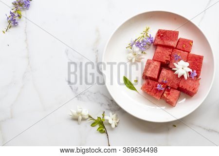 Colorful Fresh Fruits Watermelon Healthy Foods For Health Care With Purple Flowers ,jasmine In Dish 