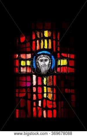 Wissembourg. France. - April 20, 2019: Stained Glass On A Black Background In The Shape Of A Cross I