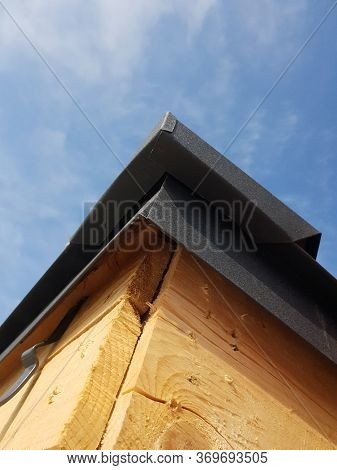 Close Up View Of Folded Roof Of House Under Construction With Holders For Gutters Water Drainage Sys