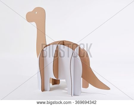 Dinosaur Brontosaurus Made Of Cardboard. Idea For The Birthday Party, Dino Party Or Photo Session