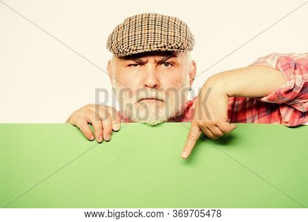 Advertisement Shop. Pensioner Grandfather In Vintage Hat Hold Poster Information Copy Space. Event A