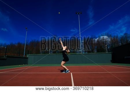 Happy Beautiful Sexy Girl Playing Tennis On The Court. Sport And Recreation, Leisure