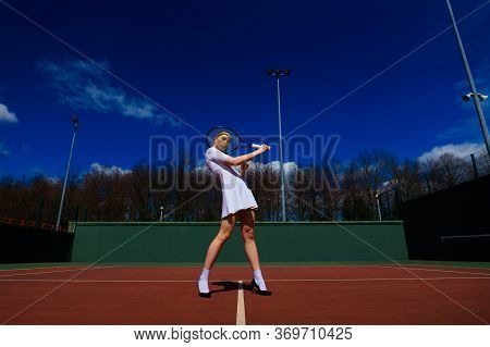 Happy Beautiful Sexy Girl Playing Tennis On The Court. Sport And Recreation, Leisure