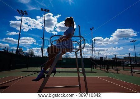 Happy Beautiful Sexy Girl Playing Tennis On The Court. Sport And Recreation, Leisure