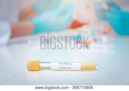 Test Tubes Containing Plasma Extracted From The Blood Of People Who Had Been Ill With Coronavirus, C
