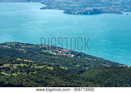 Aerial View Of The Lake Garda With The Small Village Of San Zeno Di Montagna, Photographed From The 
