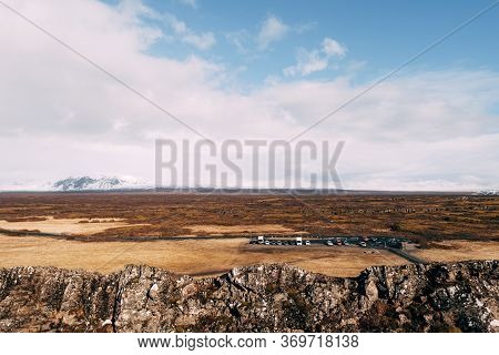 View From The Silfra Fault, In The Tingvedlir Valley In Iceland, The Vast Expanses Of Fields With Ye