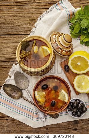 Hodgepodge, Hot Soup Served In Traditional Ceramic Bowl And Pot. Classical Eastern Europe Dish