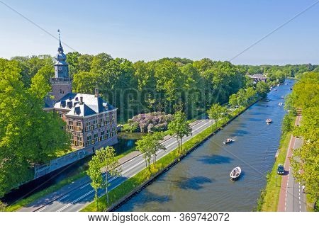 Aerial from the river Vecht with castle Nijenrode in the Netherlands