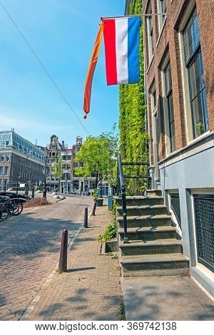 Medieval facades at the Prinsengracht in Amsterdam Netherlands at Kingsday