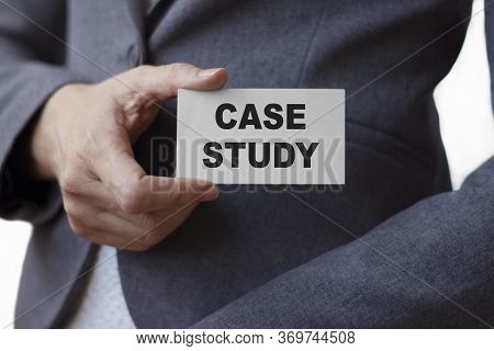 Businesswoman Shows Card With Text Case Stady. Business Or Medical Concept.