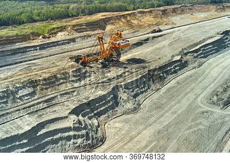 Bucket-wheel Excavator For Surface Mining In A Lignite Quarry, Heavy Industry Of Coal Mining.