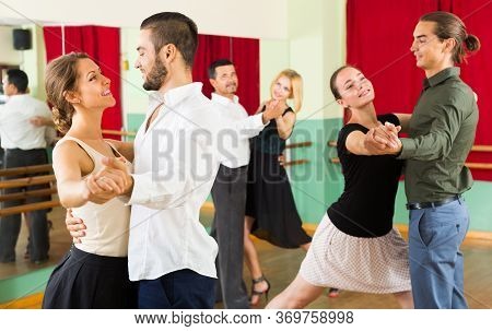 Young People Having Dancing Class In Studio