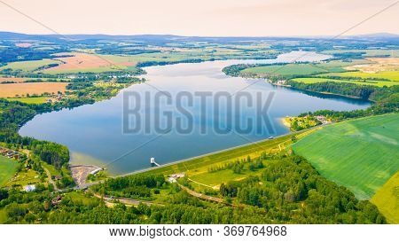 The Jesenice Reservoir on Odrava River is dam in Cheb. Aerial view to important source of sustainable energy in Czech Republic.