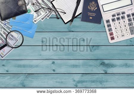 Office Flat Lay Composition With Calculator, Address Book And Other Office Items On Brown Wooden Tab