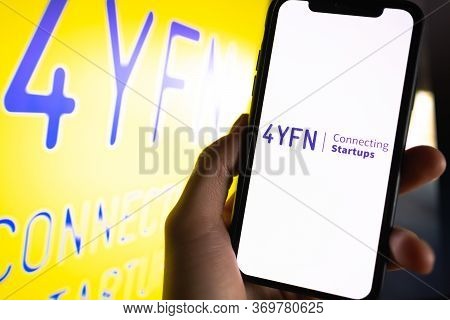 4yfn Logo On Smartphone Screen. High Quality Photo.