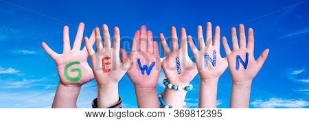 Children Hands Building Word Gewinn Means Prize, Blue Sky
