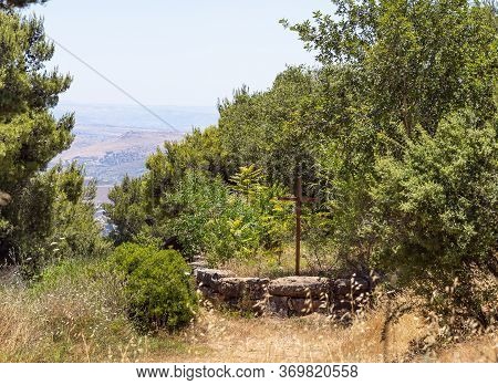 A Large Wooden Cross Stands In The Inner Garden Of The Monastery Of Lavra Netofa Near The Village Of