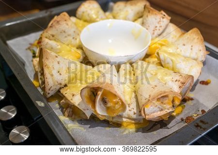 Delicious Blooming Quesadilla Ring Baked In An Oven.