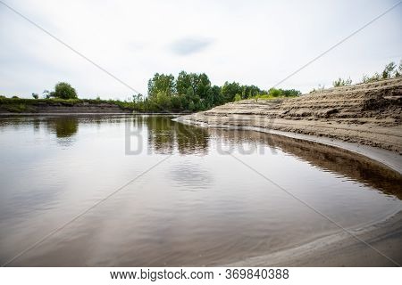Layers Of Sand On The Beach Formed By Waves And Tides, Layers Of White Sand On The Shore Along The R