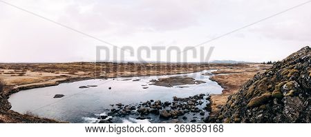 Mountain River From Ehsaraurfoss Falls, In Silfra Fault, Tingwedlir Valley.