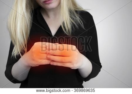 Woman Suffers From Pain In Fingers. Arthritis Or Arthrosis, Cartilage Wear, Rheumatism Of The Joints