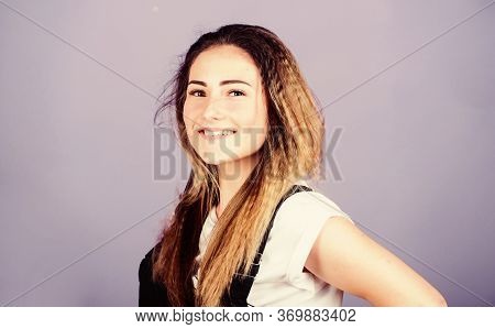 Woman Smiling Face Posing With Stylish Hairstyle On Violet Background. Voluminous Crimped Hair. Tren