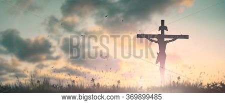 Silhouette Jesus Christ Crucifix On Cross On Calvary Sunset Background Concept For Good Friday He Is