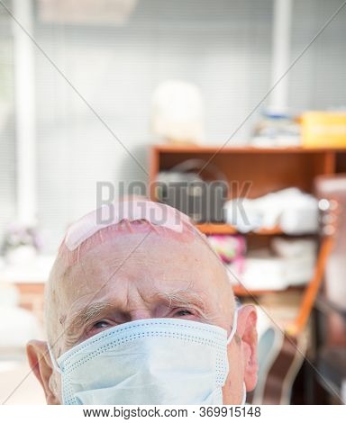 Elderly Man Wearing Face Mask As Coronavirus Protection,hampshire,united Kingdom.