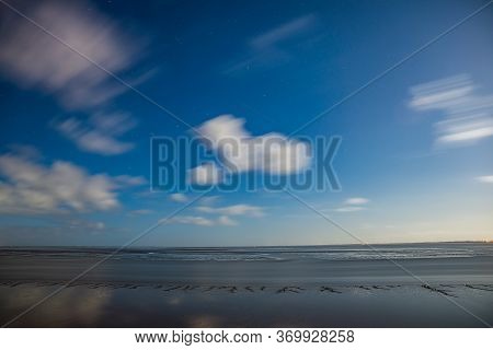 Night Photo Of Ems River On Long Exposure At Low Tide In Delfzijl, Netherlands