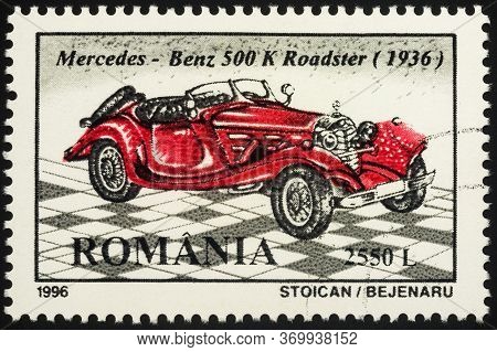 Moscow, Russia - June 03, 2020: Stamp Printed In Romania Shows Vintage Car Mercedes-benz 500k Roadst