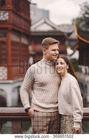 Newlywed Couple Showing Affection In Shanghai Near Yuyuan.