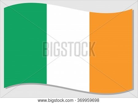 Waving Flag Of Ireland Vector Graphic. Waving Irish Flag Illustration. Ireland Country Flag Wavin In