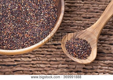 Black Quinoa Seeds - Chenopodium Petiolare. Wood Background