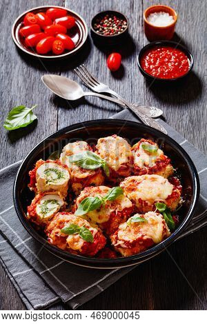 Chicken Rollatini With Spinach Ricotta Filling In Marinara Sauce Topped With Mozzarella Cheese And F