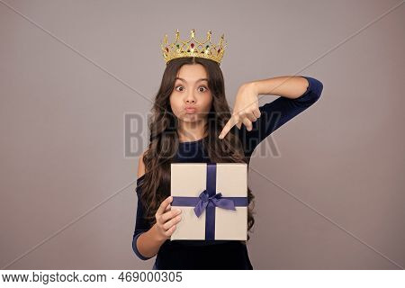 Teenager Kid Princess In Crown With Present Box. Teen Girl Giving Birthday Gift. Present, Greeting A
