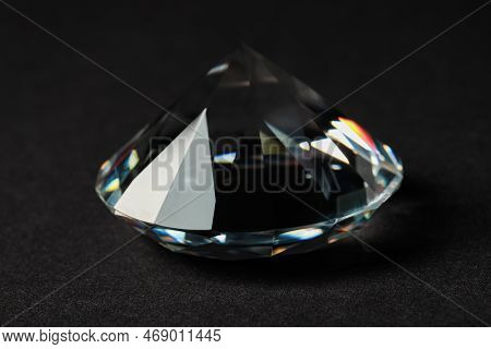 Beautiful Dazzling Diamond On Dark Background, Closeup. Precious Gemstone
