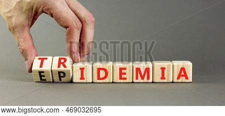 Covid-19 Epidemic Or Tridemic Symbol. Concept Word Epidemic And Tridemic On Wooden Cubes. Doctor Han