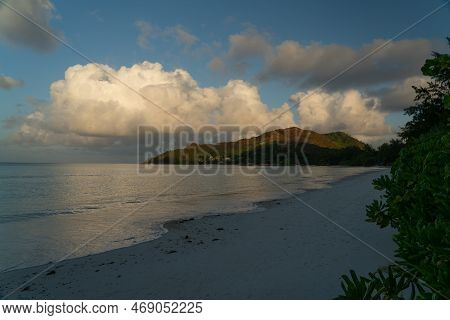 View Along The Long Beach Of Anse Volbert In The Evening.