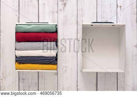 Folded Clothes In  Box. Modern  Cupboard Konmari Method, Organization Of Home Storage, Order And Min