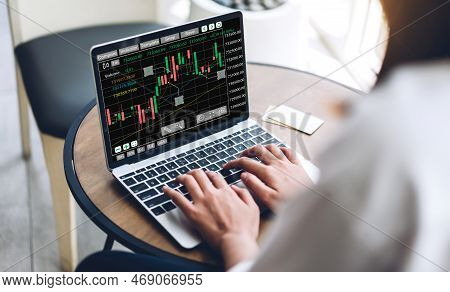 Successful Of Business Trader Investor Woman Use Technology Laptop Trading Graph Of Block Chain Stoc