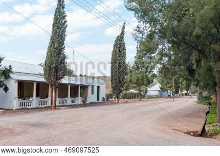 Loxton, South Africa - Sep 2, 2022: A Gravel Street Scene, With Historic Houses, In Loxton In The No