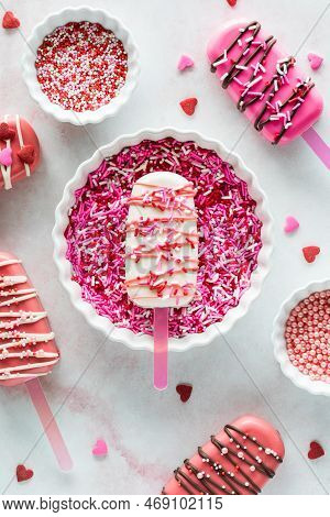 A Sweet Cakesicle In A Bowl Of Sprinkles Surrounded By Cakesicles And Sprinkles