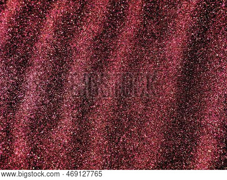 Bokeh Light Of Pink Glitters On Black Background. Magenta Glitter Texture. Sparkling Glitter Wrappin